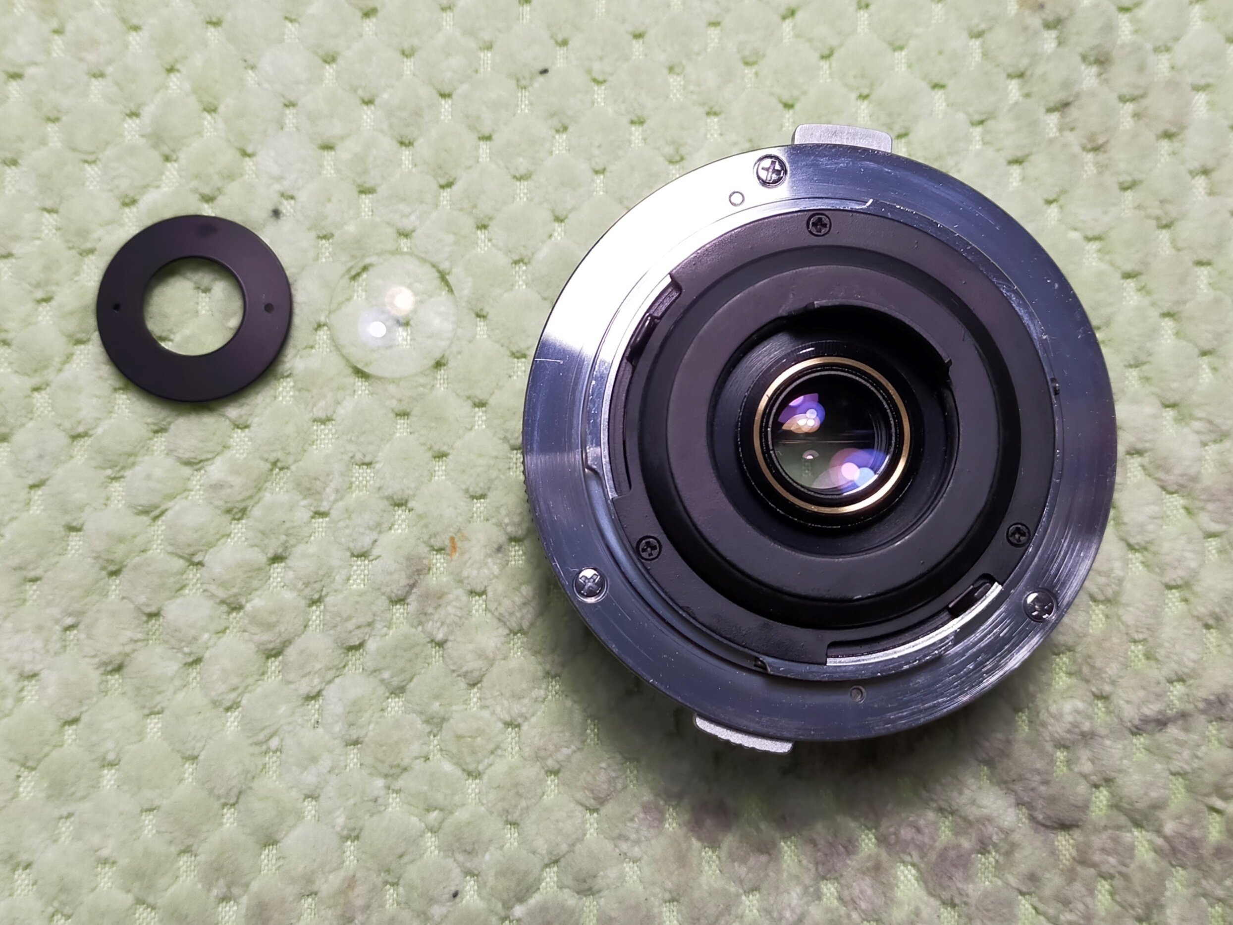 OLYMPUS OM-SYSTEM 28mm F/3.5の分解｜フィルムカメラ修理のアクアカメラ