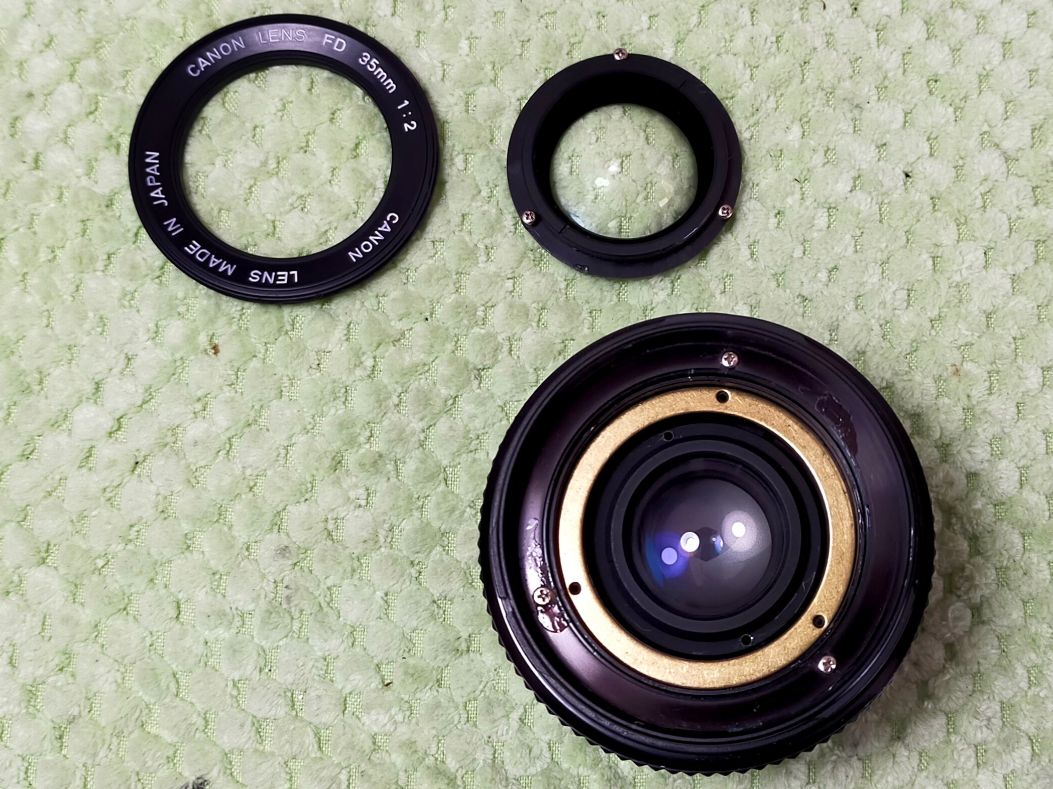 Canon New FD 35mm F/2の分解とカタつきの解消法｜フィルムカメラ修理 