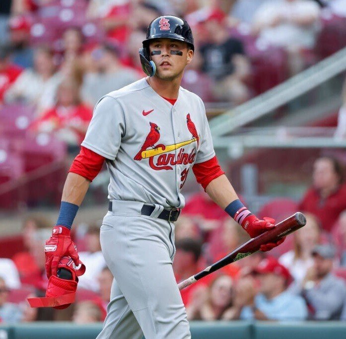 Lars Nootbaar grabs the pepper grinder after Albert Pujols hits