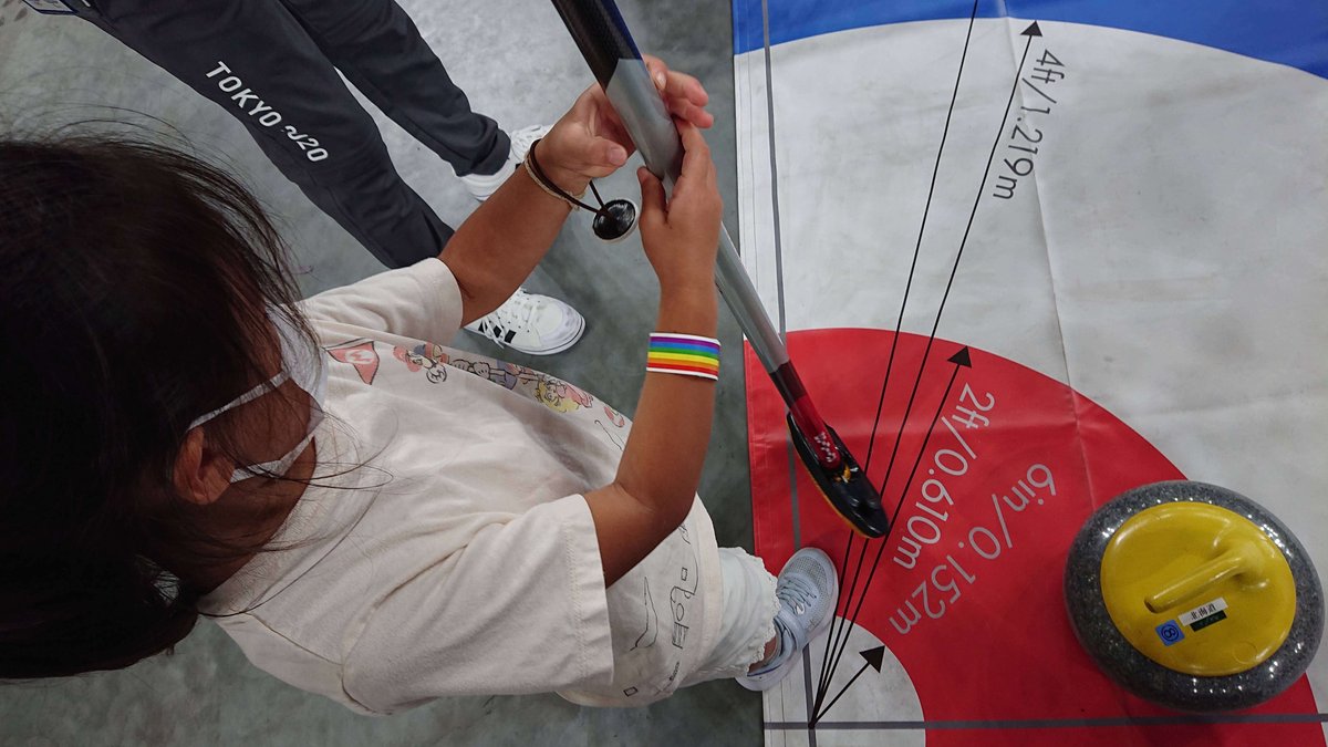 Girl playing with a stick