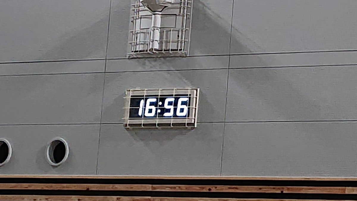 Digital clock showing 16:56