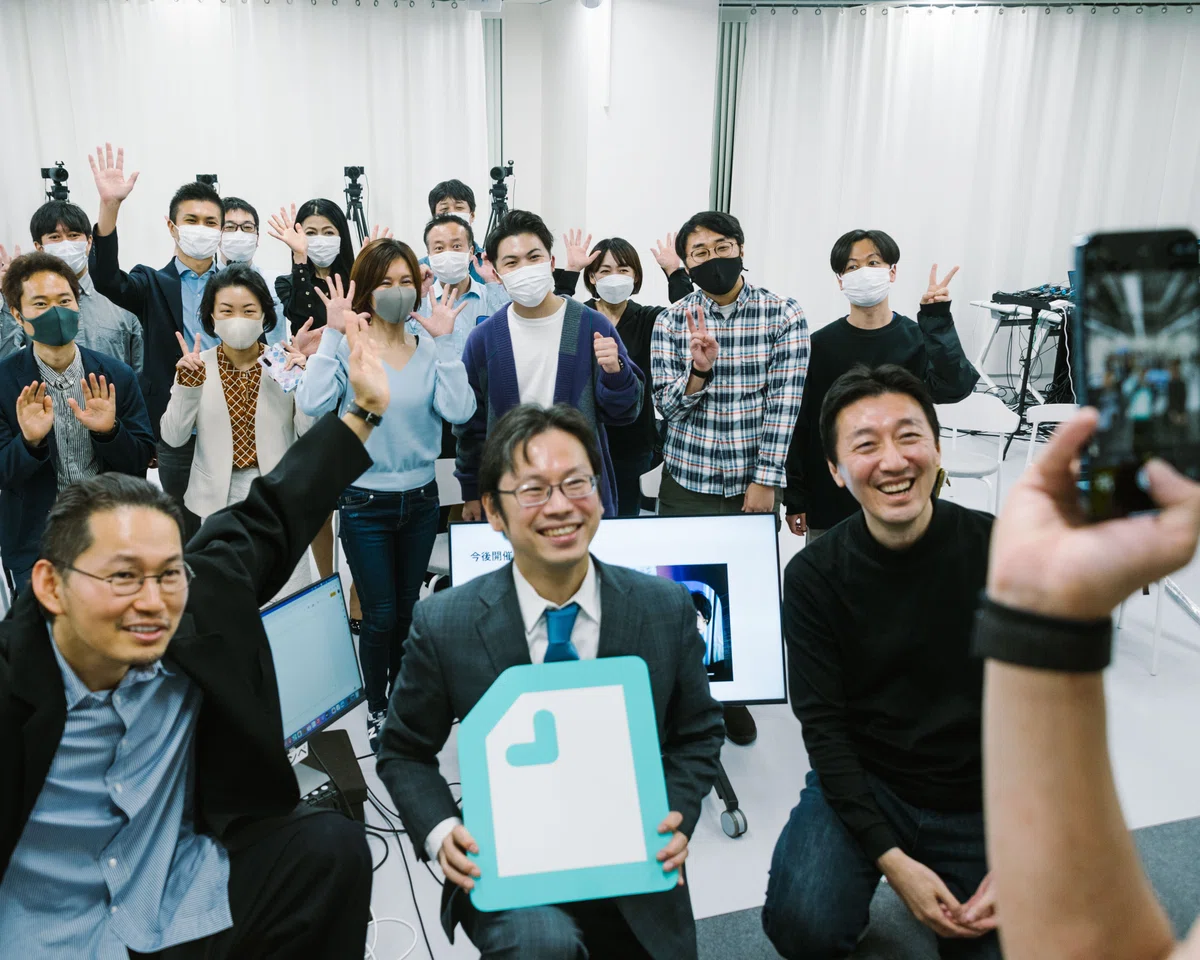 現地観覧のみなさんと登壇者の集合写真