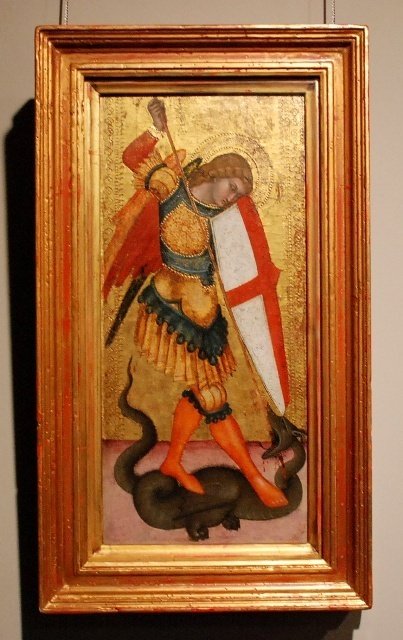 大天使ミカエルが足で龍を踏みつけやっつけようとしている絵 神の戦士であるミカエルは悪を退治する役割。  メッセージは 「私たちの心の中に潜む悪に立ち向かおう」