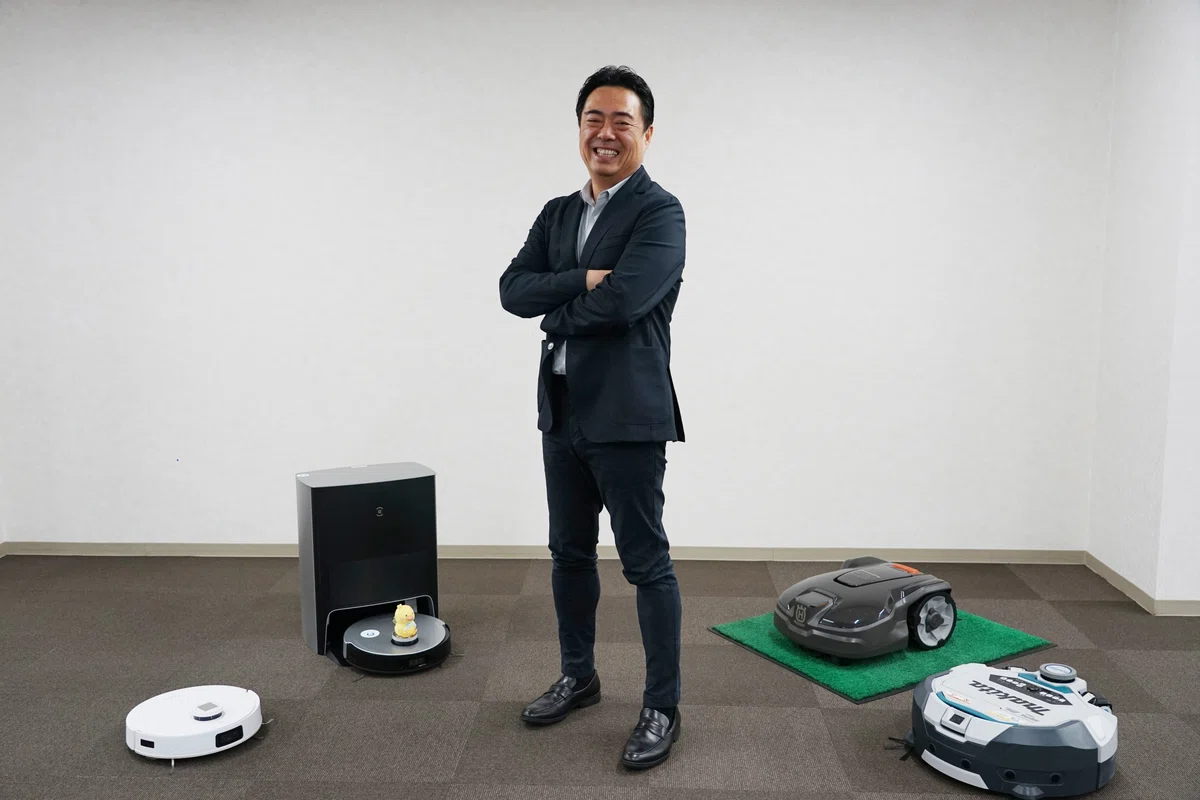 リプロ社長 with ロボット
