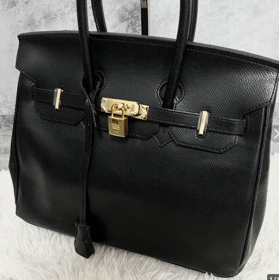 そのバッグ…出品して大丈夫？｜黒猫