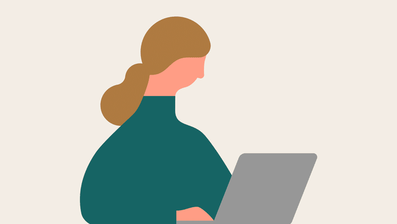パソコンを眺める女性の画像