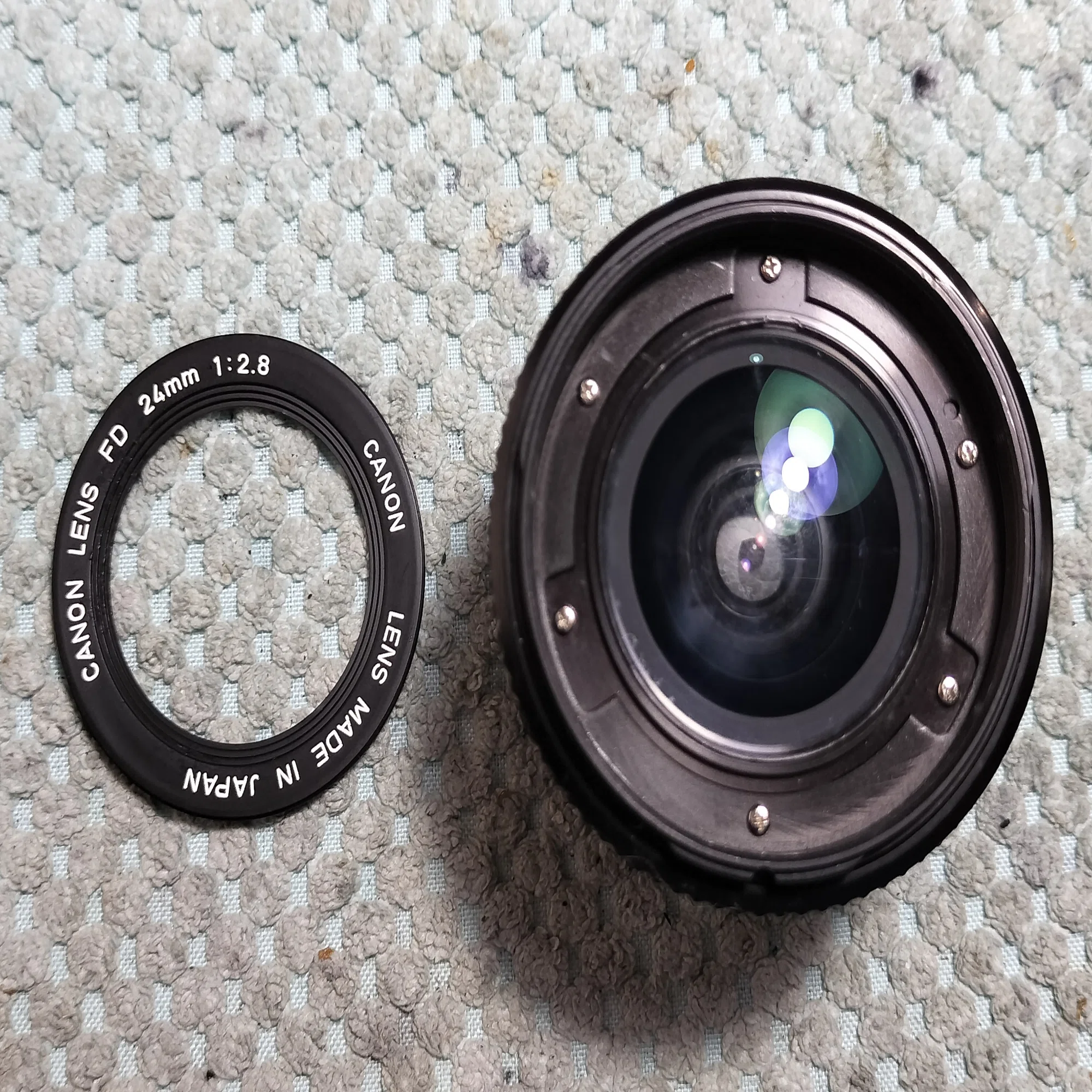 Canon New FD 24mm F/2.8の分解｜フィルムカメラ修理のアクアカメラ