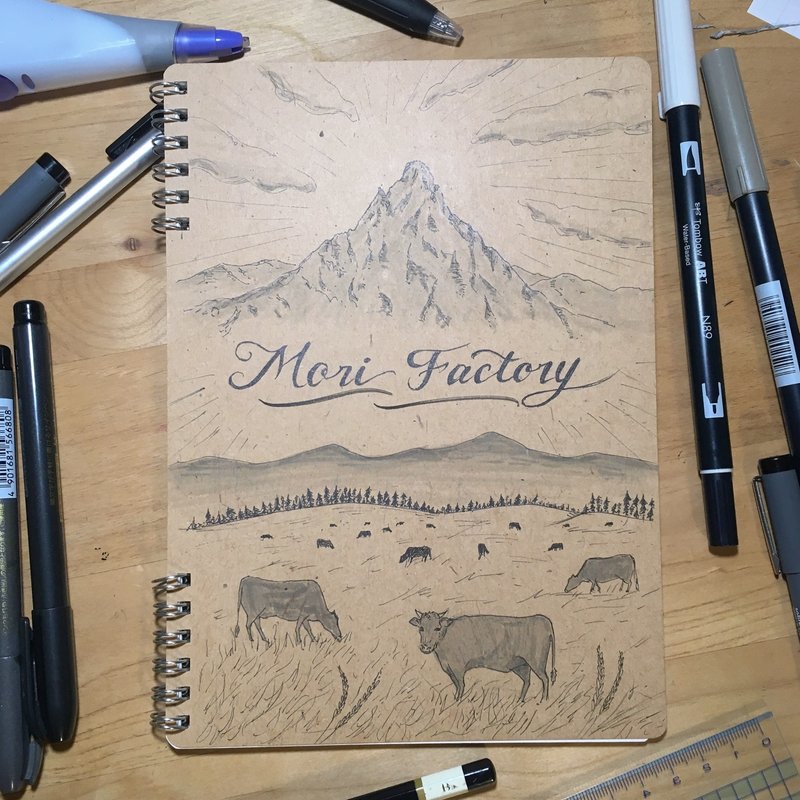 革職人さんのノートをデザイン。山と牧場をイメージ。