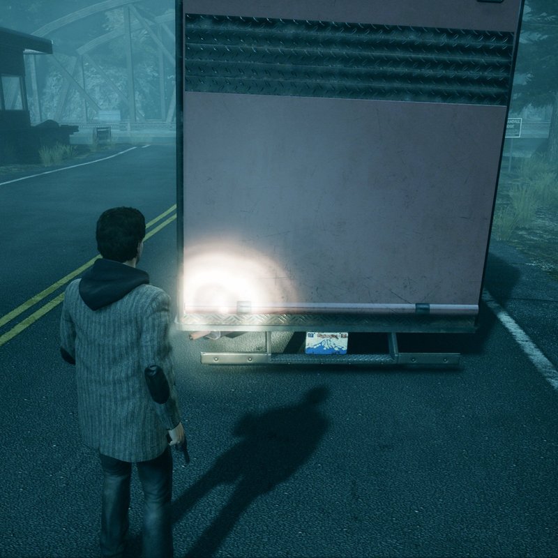 ゲーム『Alan Wake』のスクリーンショット。放置された車両にアメリカのワシントン州のナンバープレートがついている