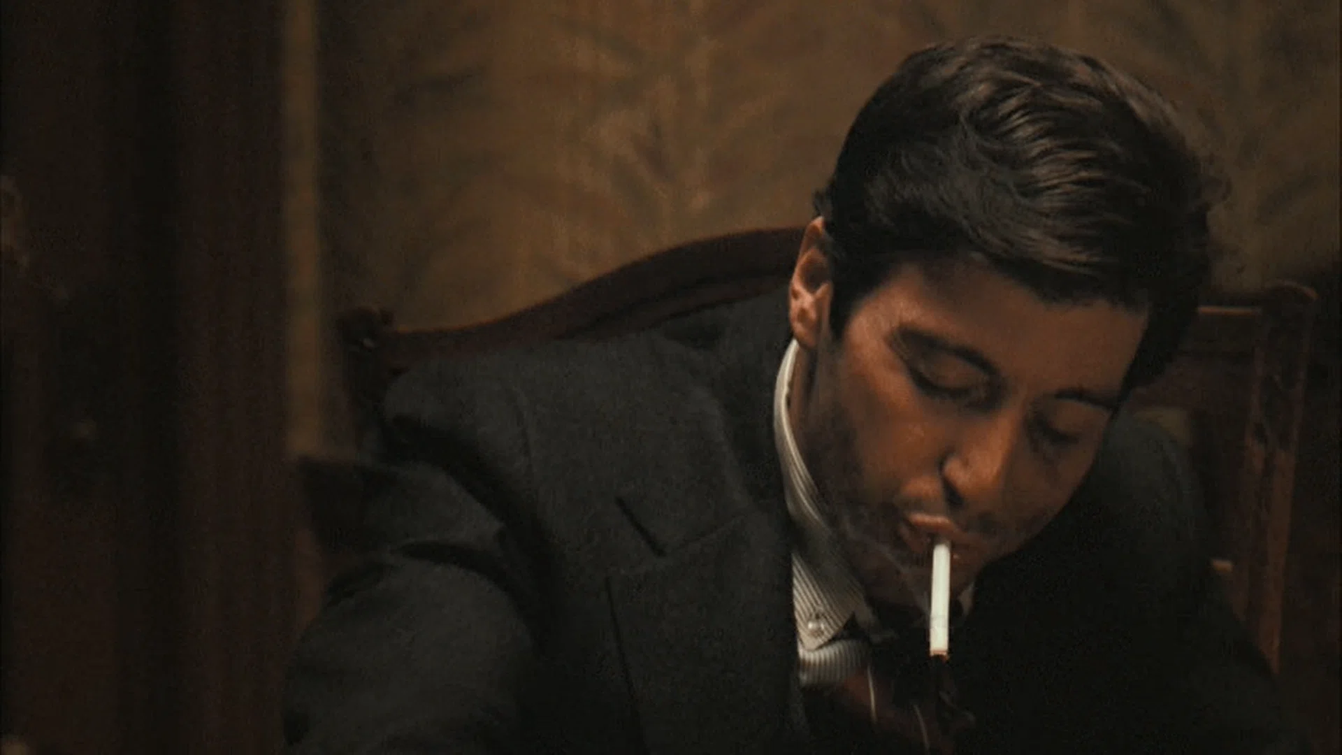 don corleone cigarettes Vito smoking a cigar and drinking whiskey Every Cigarette Smoked in The