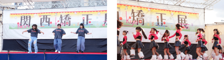 関西矯正展（2023年11月11日(土)、12日(日)開催）のステージでダンスを披露する地元の学生とチアダンスを披露する地元の学生