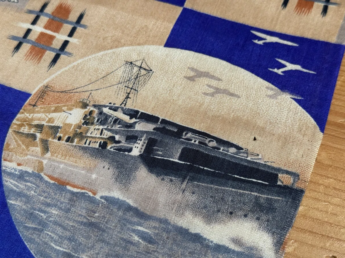 子どもの成長祝う産着などに、強さの象徴の軍事関連絵柄ー軍事と生活が 