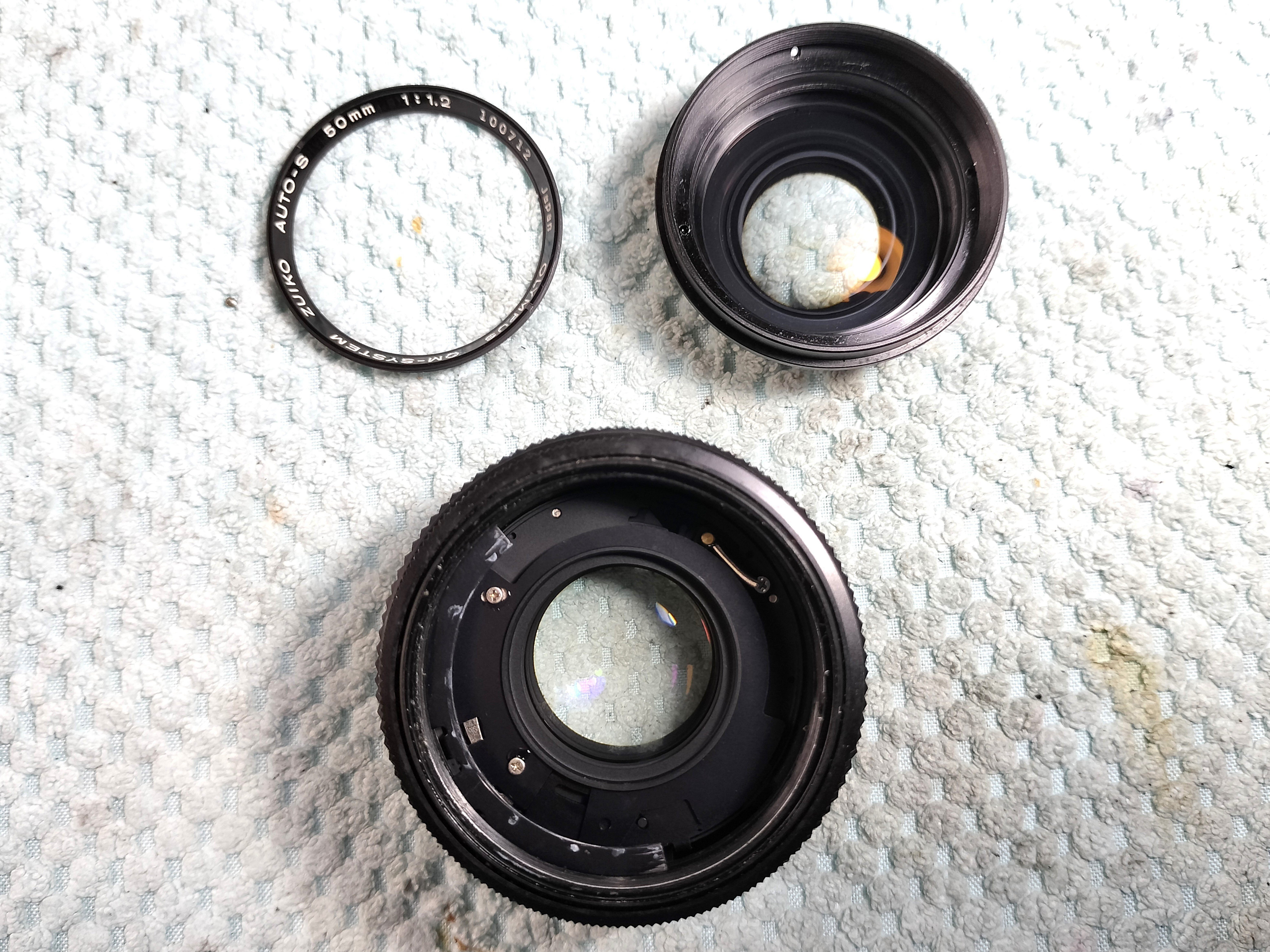 Olympus OM-SYSTEM 50, 55mm F/1.2の分解｜フィルムカメラ修理のアクア