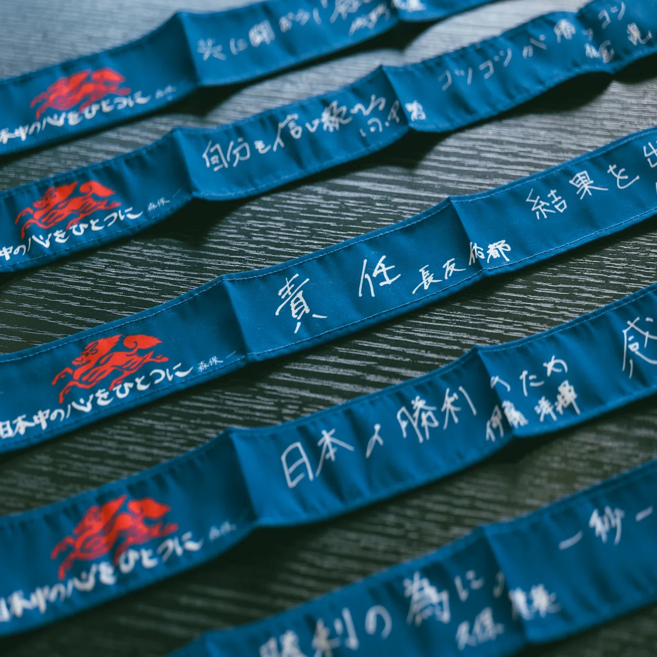 サッカーで日本中の心をひとつに。13万本の「勝利のハチマキ」がつない 