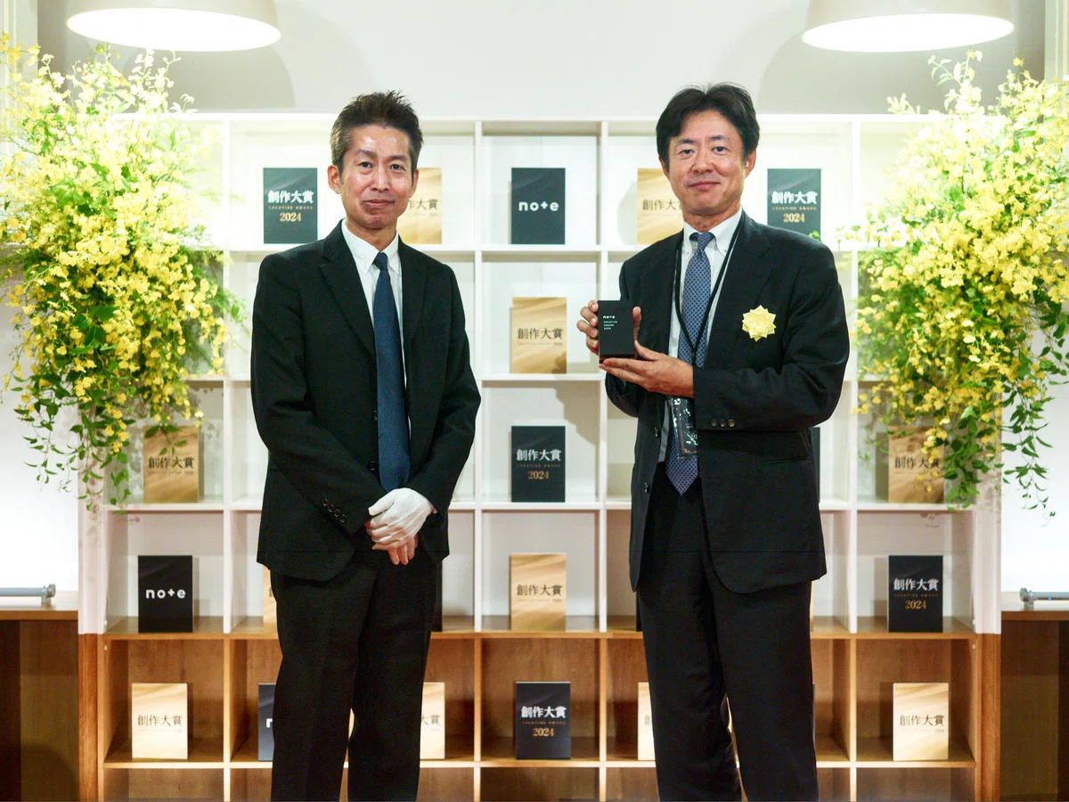 note代表の加藤(左)と三宅孝之さん(右)