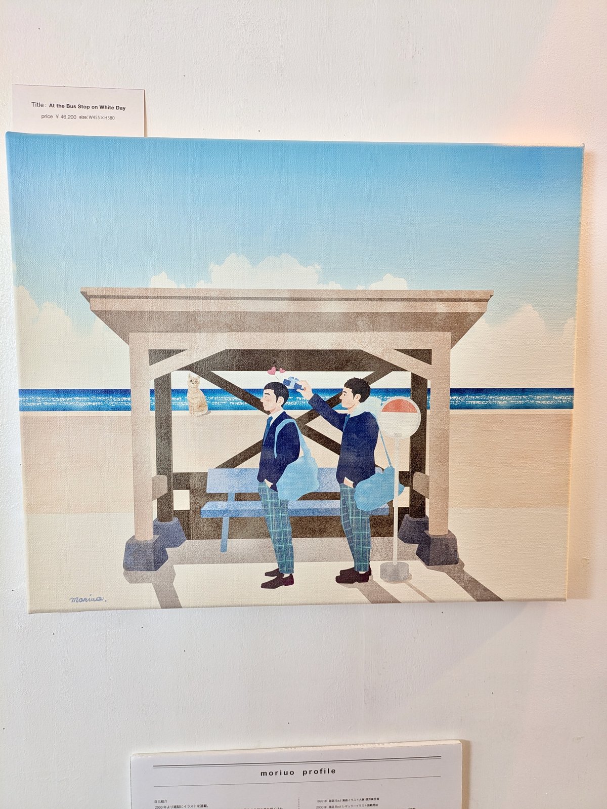 Is it Valentine's Day or White Day? At a seaside bus stop, a young man is tapping his lover on the head with a present.