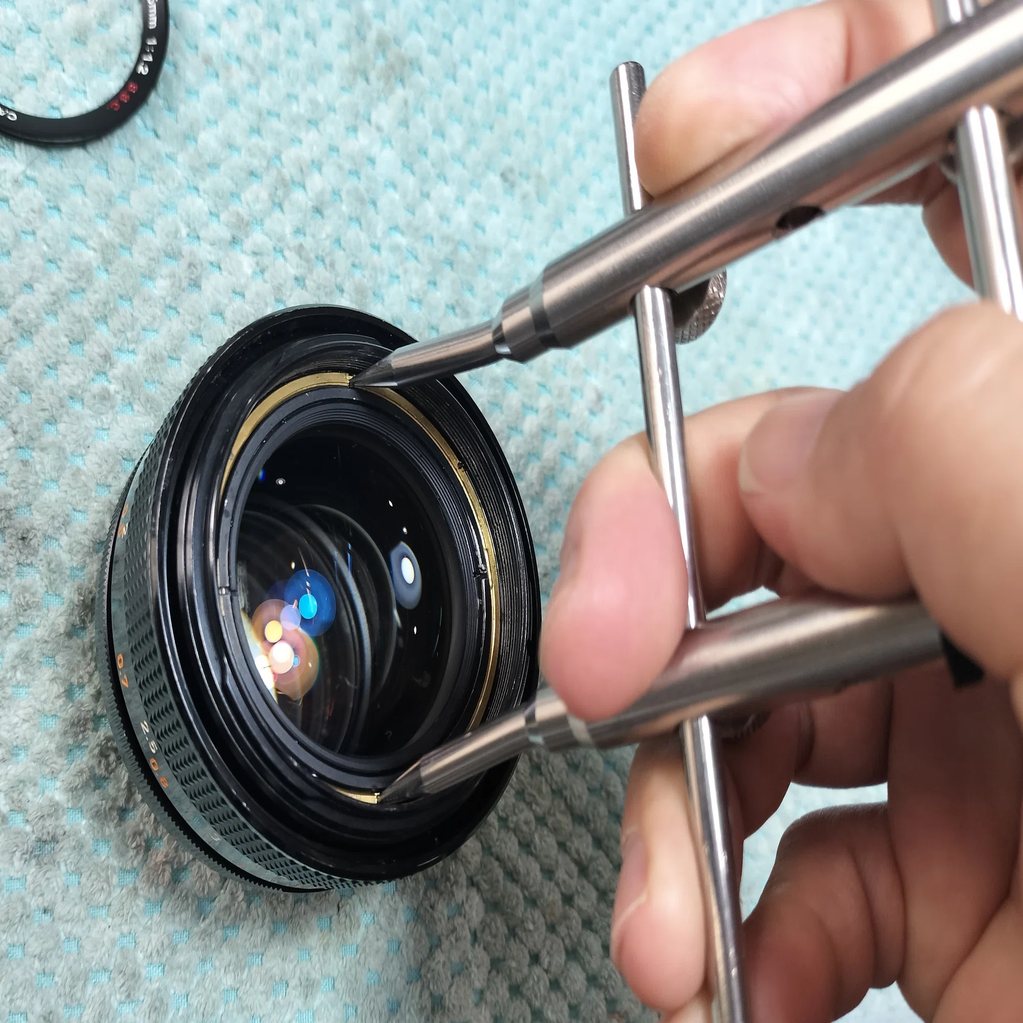Canon FD 55mm F/1.2の分解｜フィルムカメラ修理のアクアカメラ