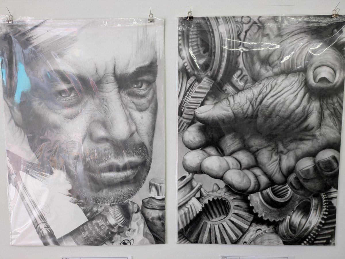 Works by I44DRA. Ultra-detailed pencil drawings. There are two pieces, the left one is a male figure, and the right one is a drawing of the wrinkled hands of a craftsman.