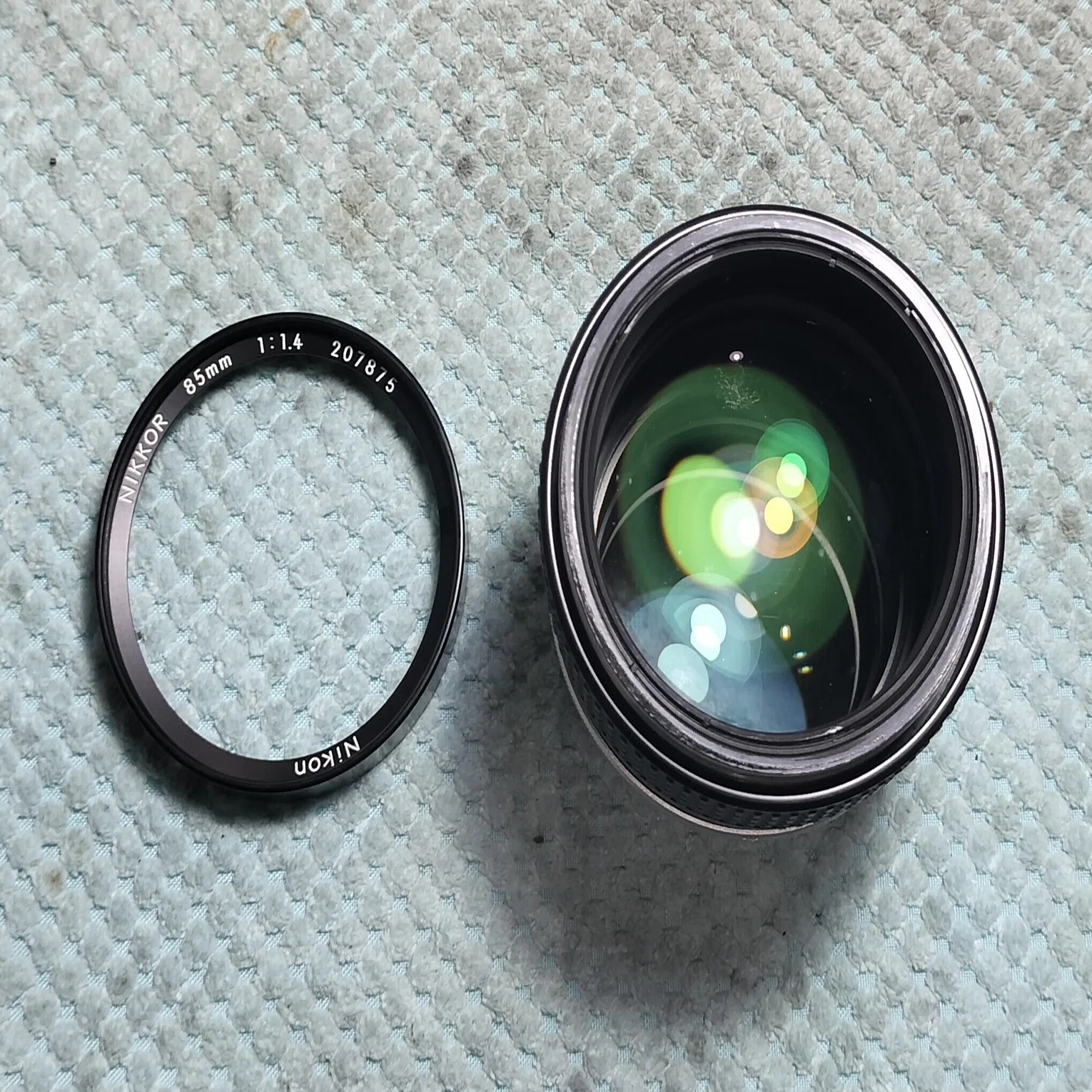 Nikon Ai-s Nikkor 85mm F1.4の分解｜フィルムカメラ修理のアクアカメラ