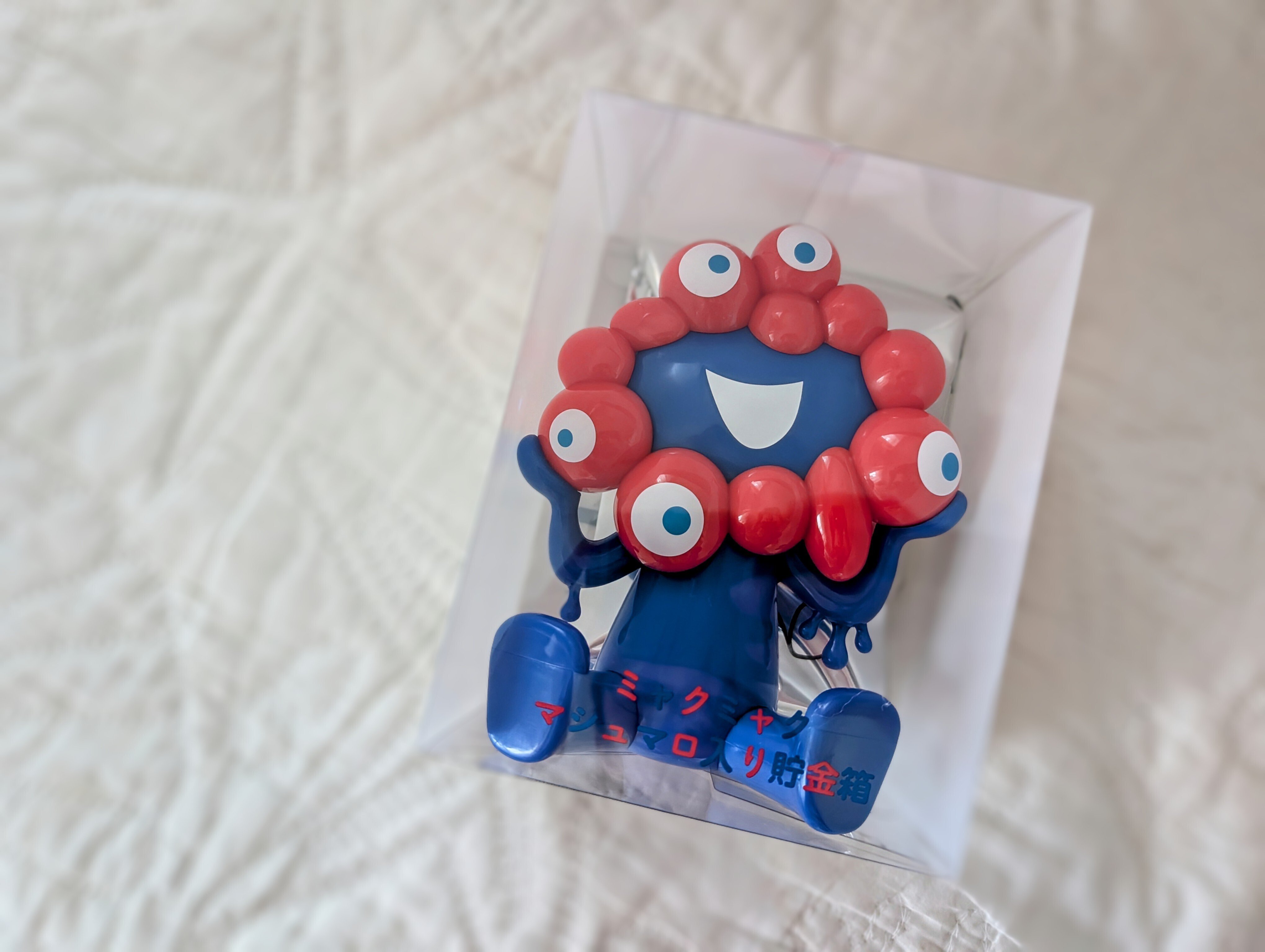ミャクミャク　貯金箱 イチオシお土産！ミャクミャク貯金箱マシュマロ付き｜shima