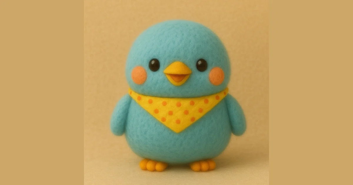 青い小鳥のキャラクターが黄色いバンダナを巻き、ドヤ顔で立っている。丸い体とつぶらな瞳、ふわふわした質感が特徴。