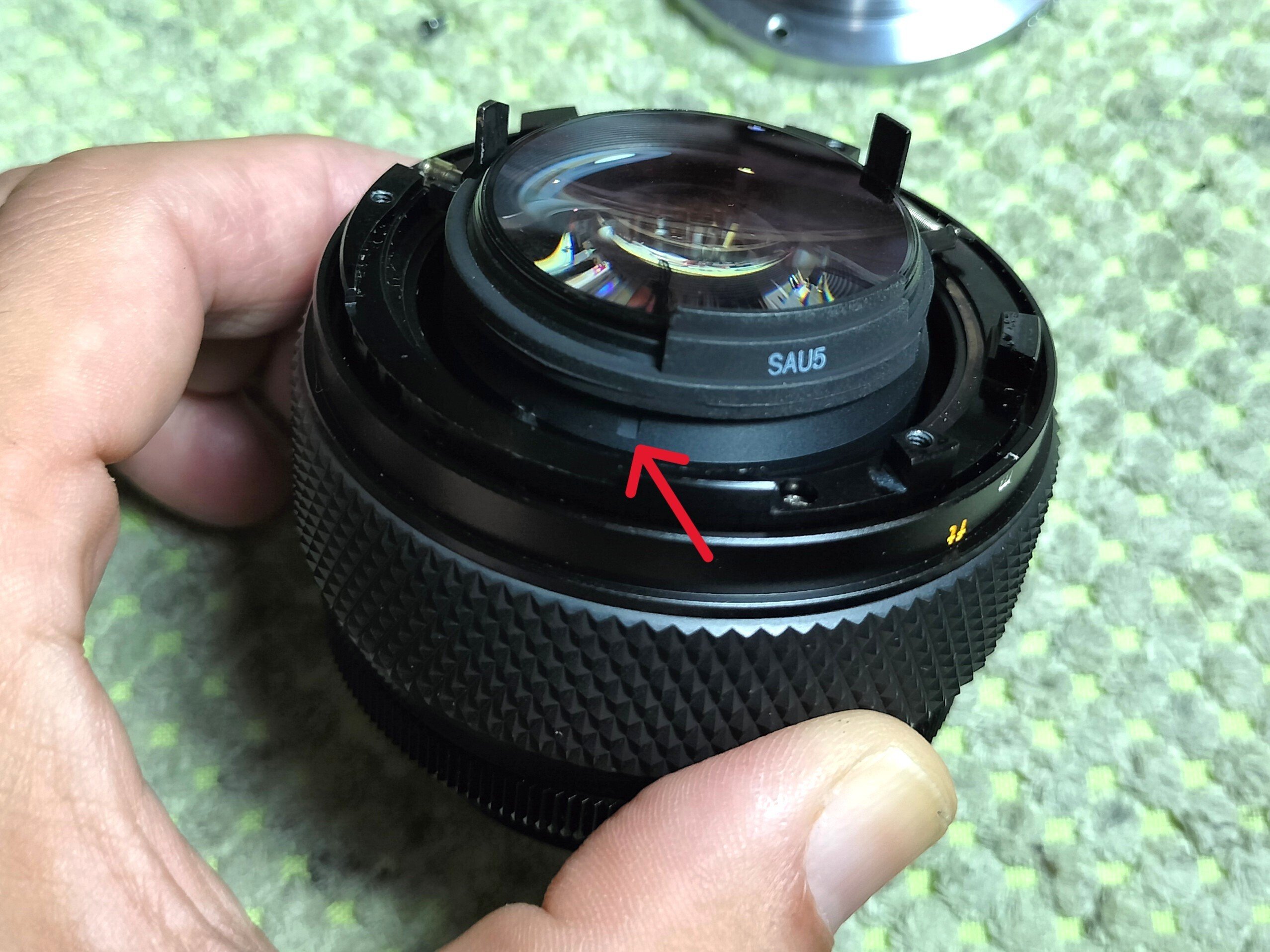 Olympus OM-SYSTEM 50, 55mm F/1.2の分解｜フィルムカメラ修理のアクア