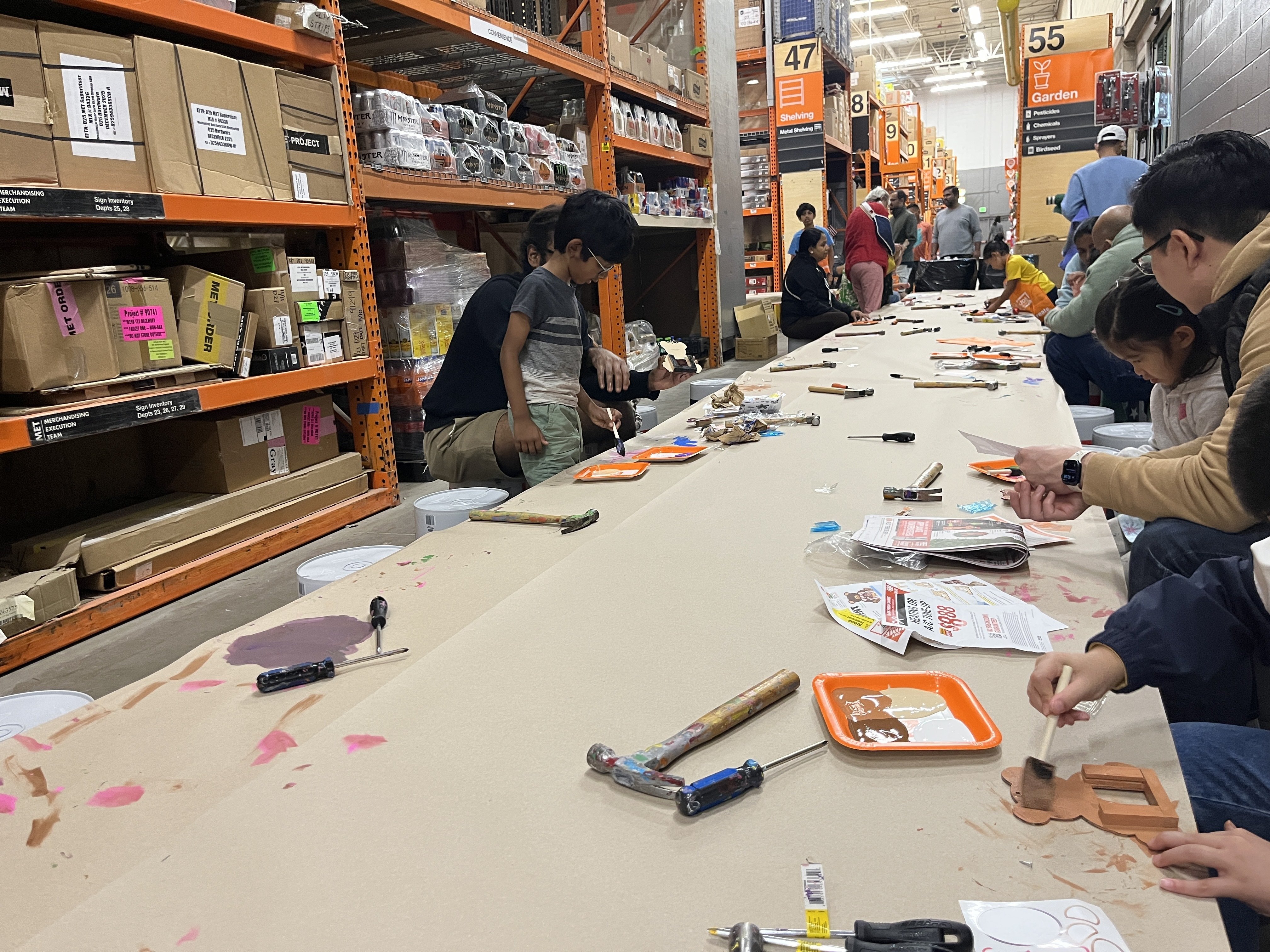 A corner of the store has been turned into a workshop. Hammers, screwdrivers, paint, etc. will be provided.