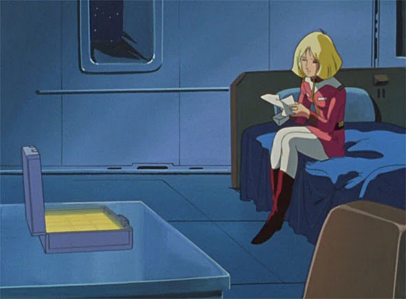 Sayla Mass receiving Char Aznable's gold bars in Mobile Suit Gundam
