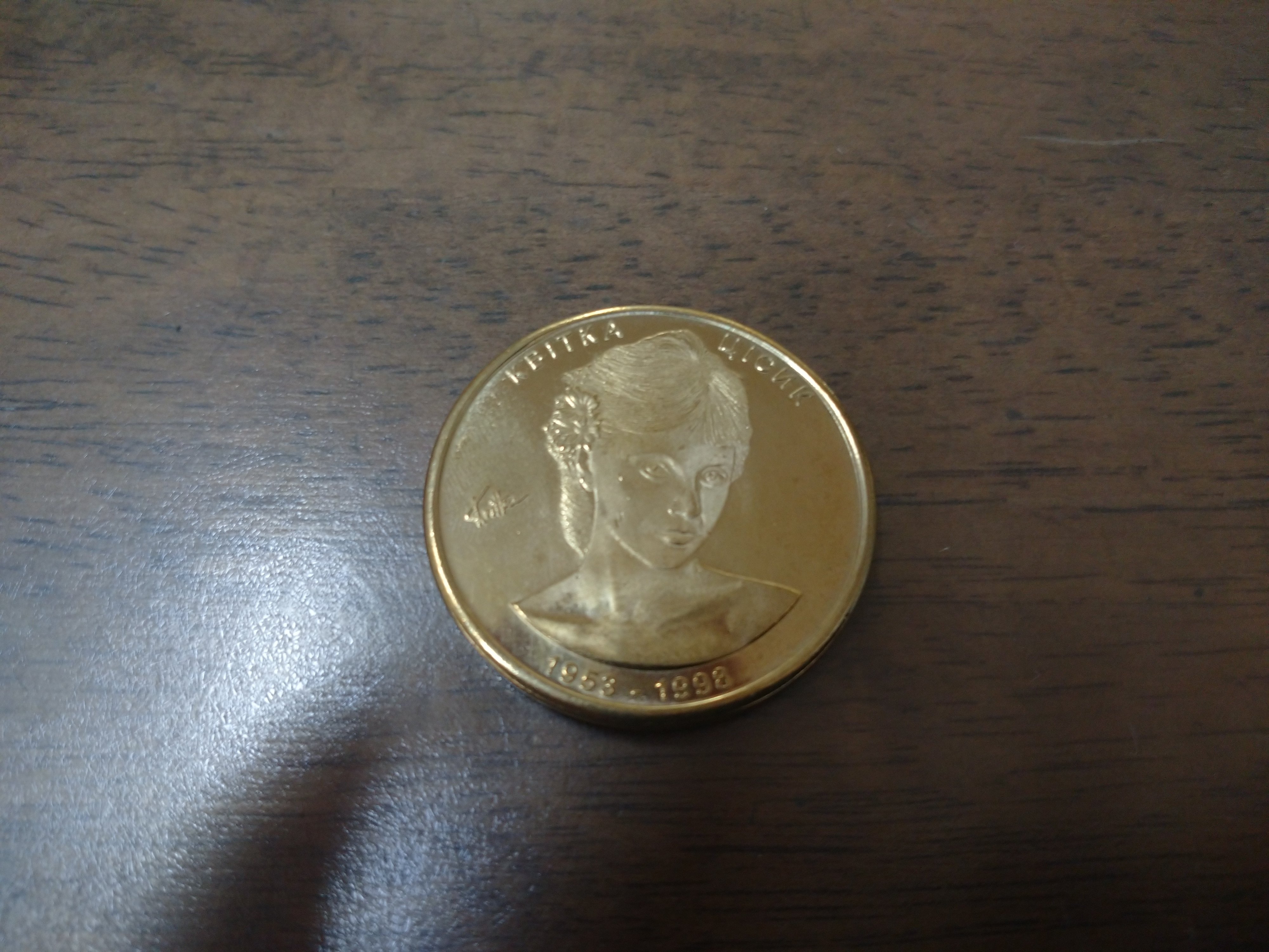 友達からもらったメダル 1936年のオリンピックで、日本の選手、西田修平とチームメイトの大江