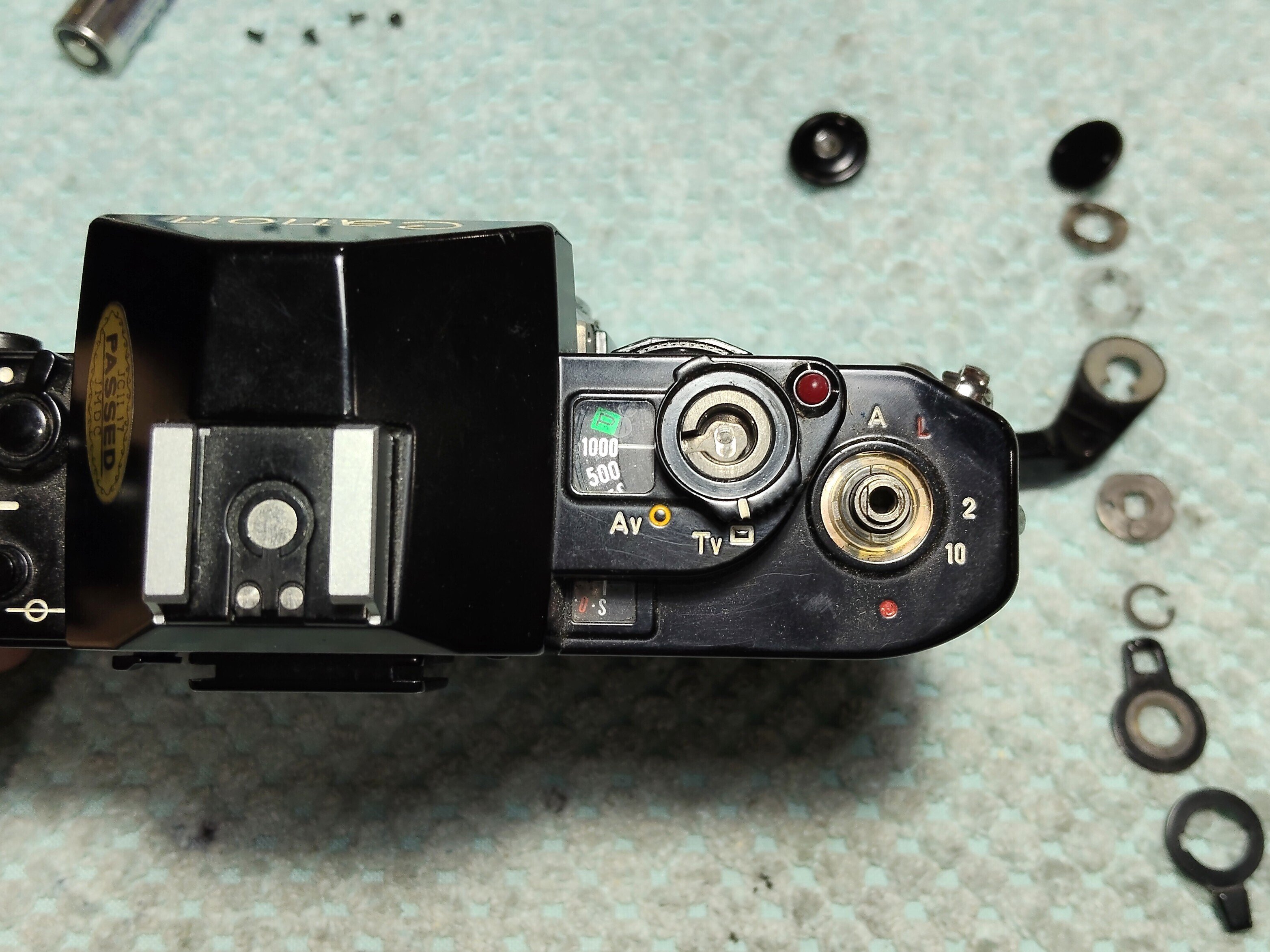 Canon A-1の分解｜フィルムカメラ修理のアクアカメラ