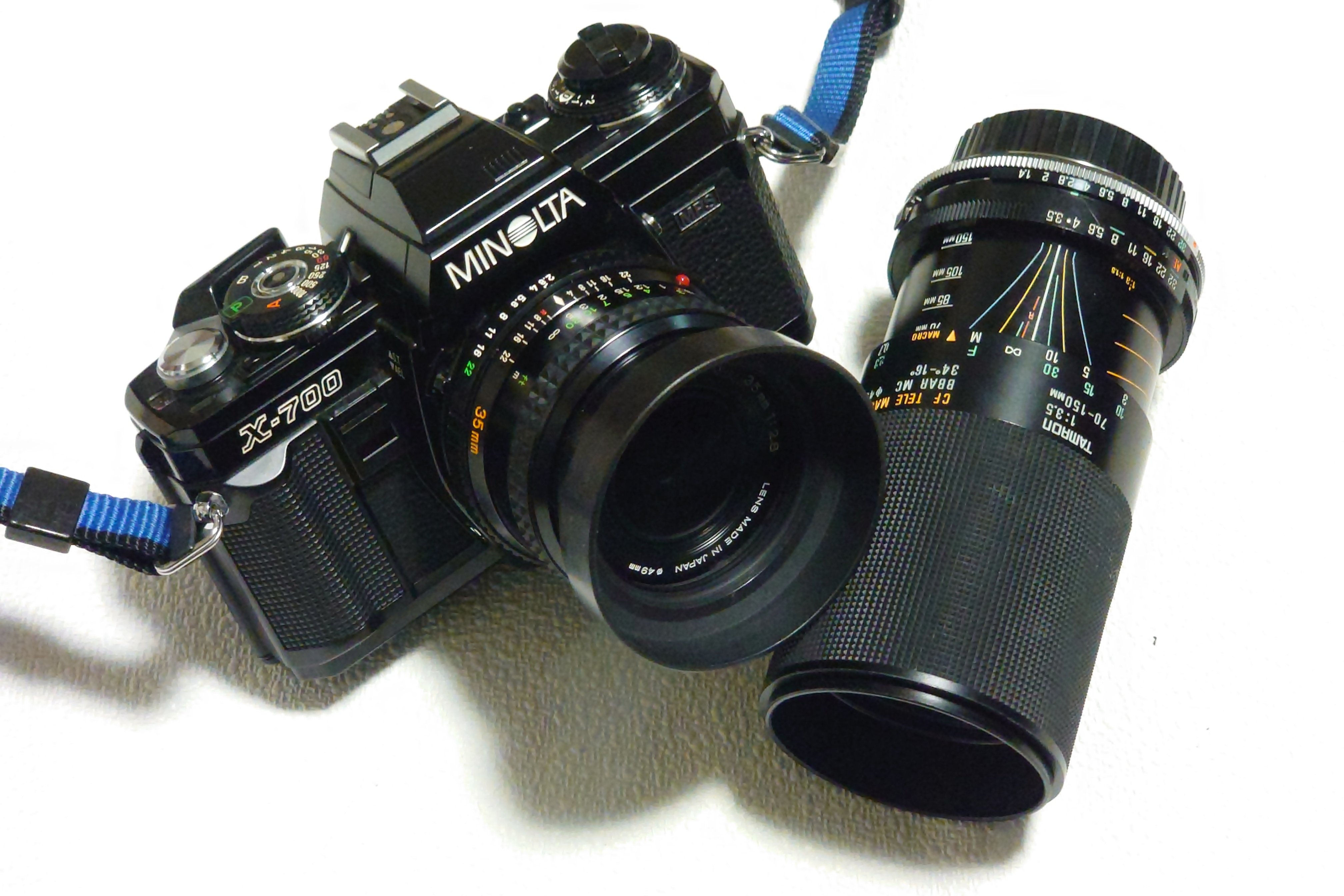Nikon 一眼レフカメラ Canonミノルタレンズ付き むかしミノルタありき プロローグ｜大佐藤