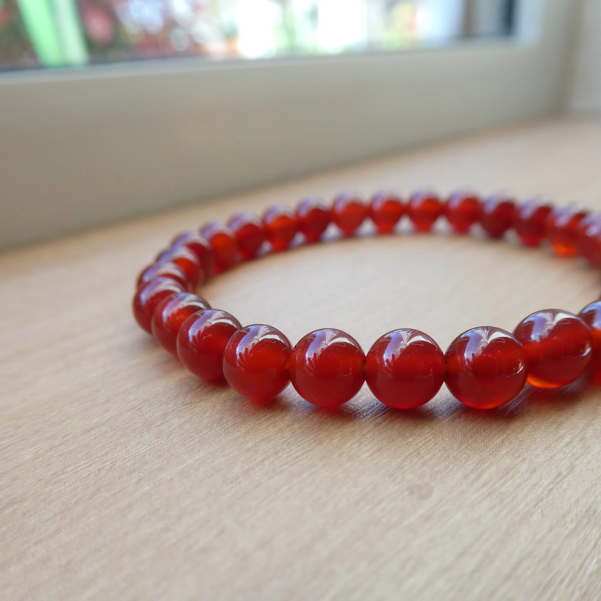 Warmly Supporting Human Connections: A Simple Red Agate Bracelet 