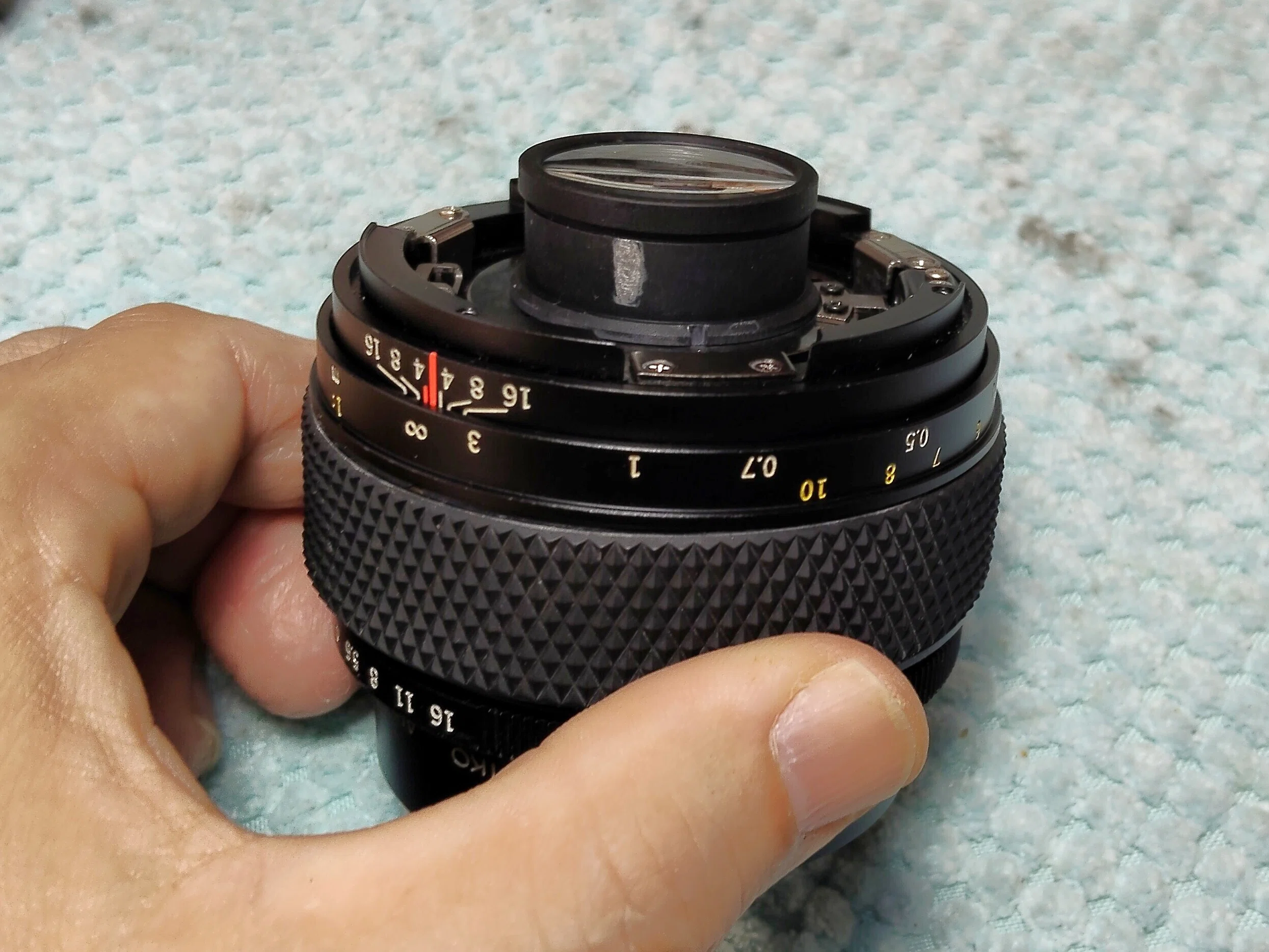 Olympus OM-System 50mm F2 Macroの分解｜フィルムカメラ修理のアクア