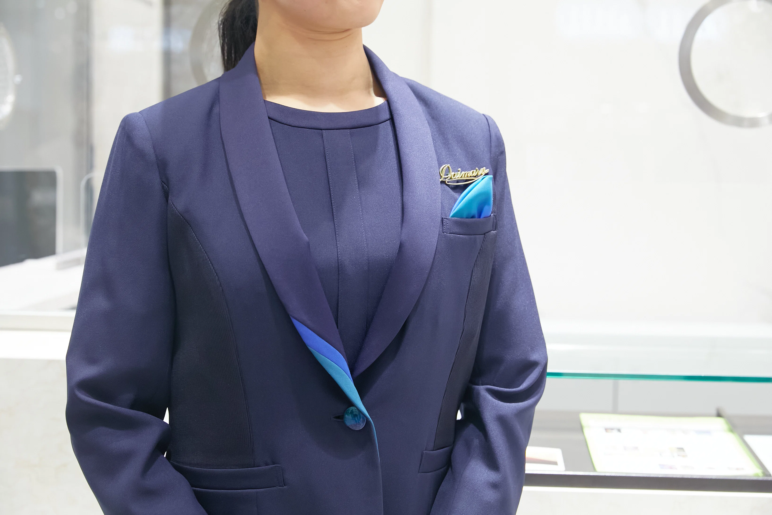 百貨店の価値を受け継ぐために。現場とともにつくった、新しい制服