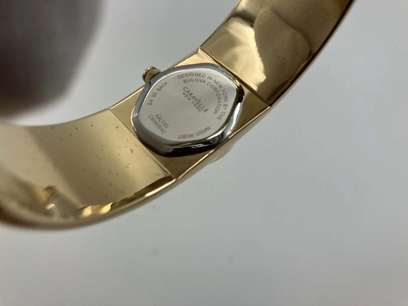 Caravelle New York Quartz Bangle Watch Blue Dial Gold Tone Boxed 