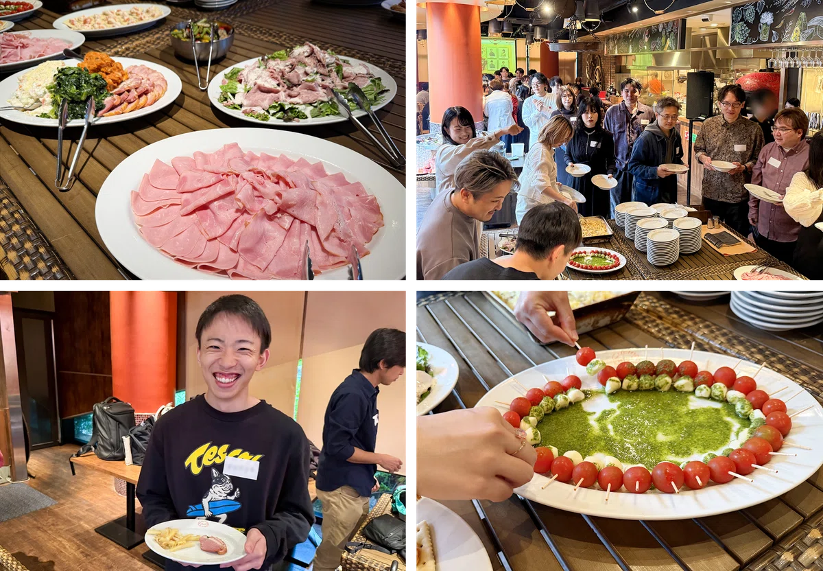 料理を手に取るメンバー