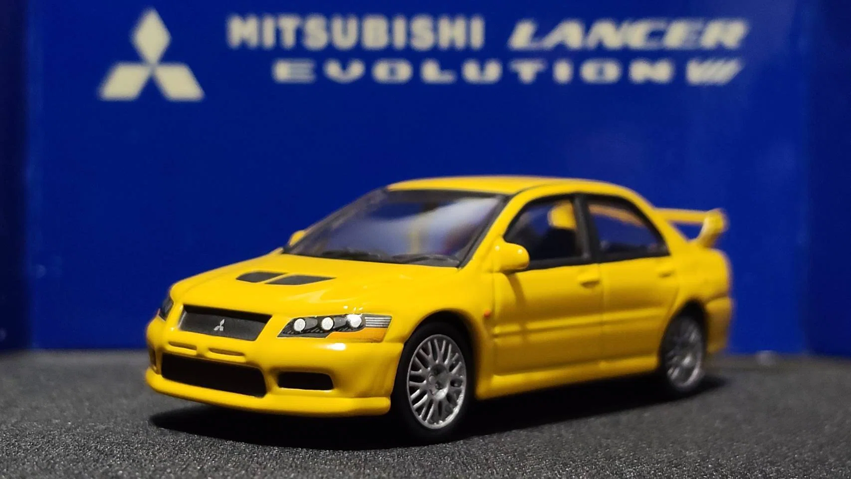 AUTOart 三菱 ランサー エボリューション VII AUTOart 1/64 Mitsubishi Lancer Evolution VII (Yellow)｜岡田衛