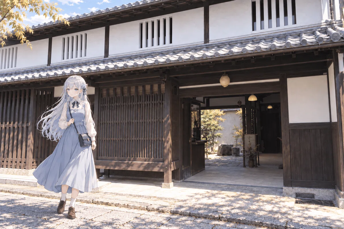ならまち格子の家をモデルにした建物の前に立つツムギ。