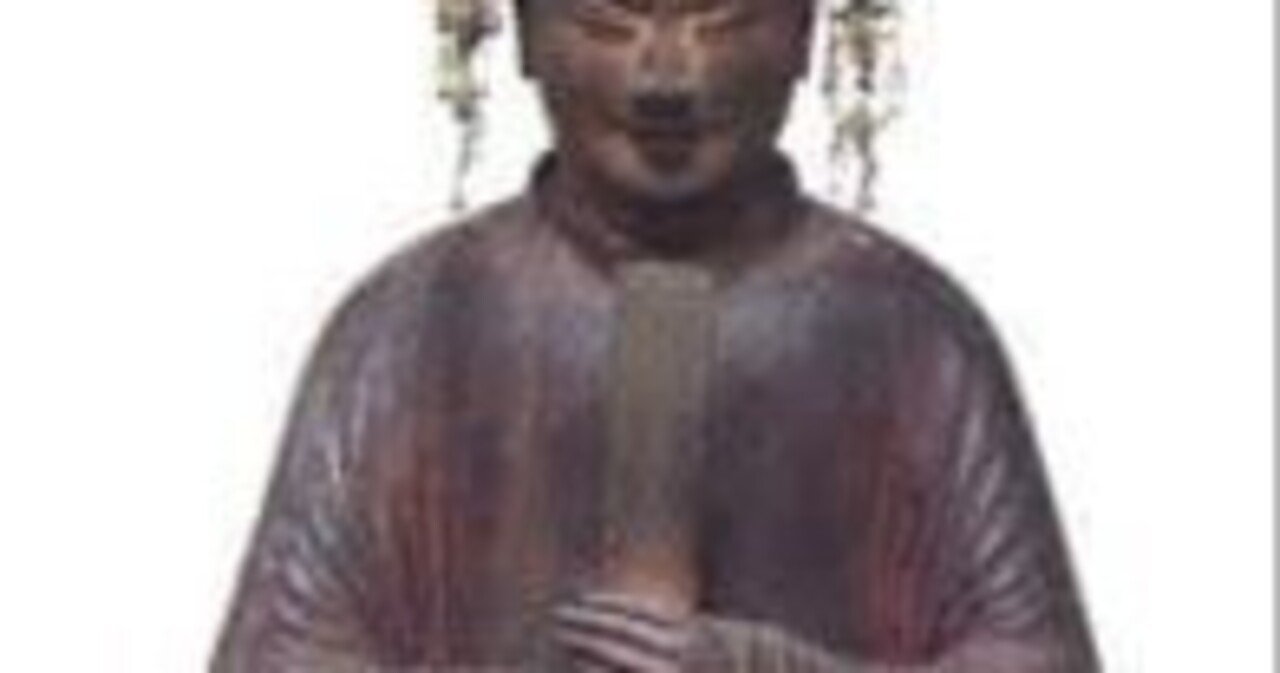 笏の持ち方。聖徳太子の時代には笏はなかった。おそらく大型木簡だろう