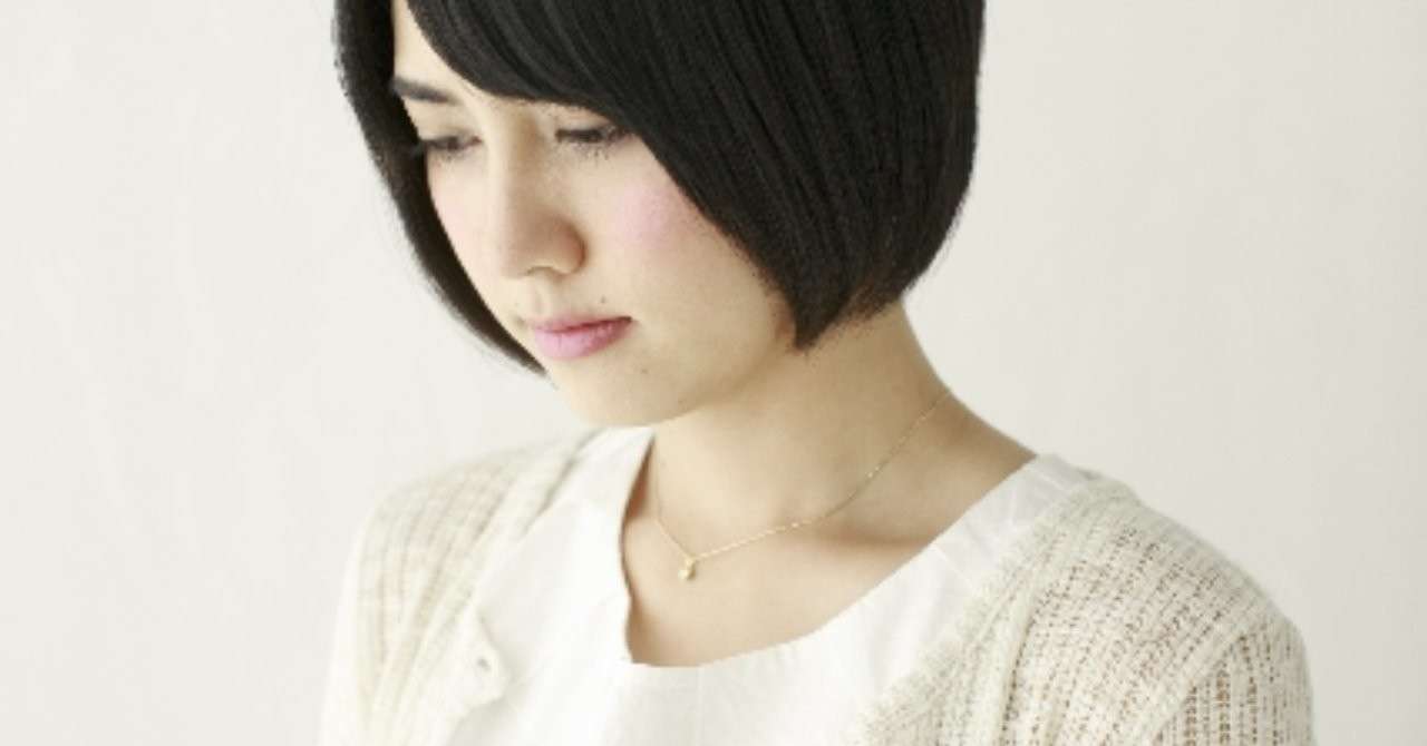 _photo_AC_顔を伏せる女性