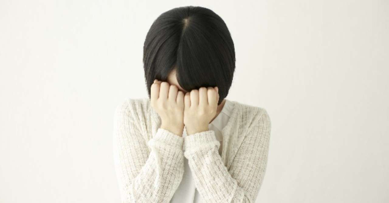 _photo_AC_顔を覆う女性