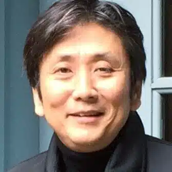 佐野真一