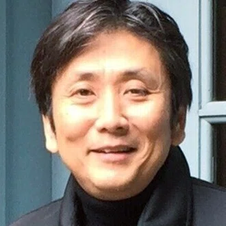 佐野真一
