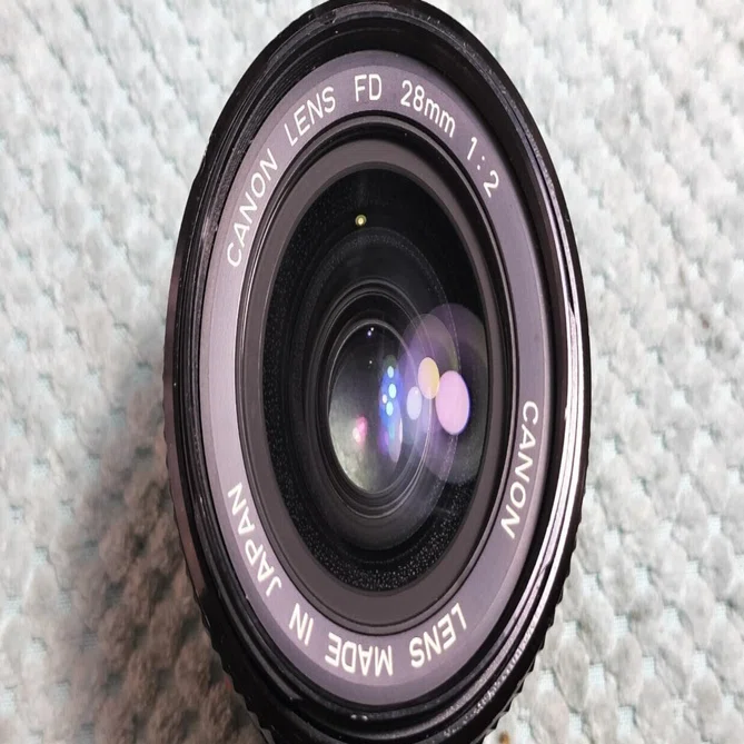 Canon New FD 28mm F/2の分解とコロ修復｜フィルムカメラ修理のアクア