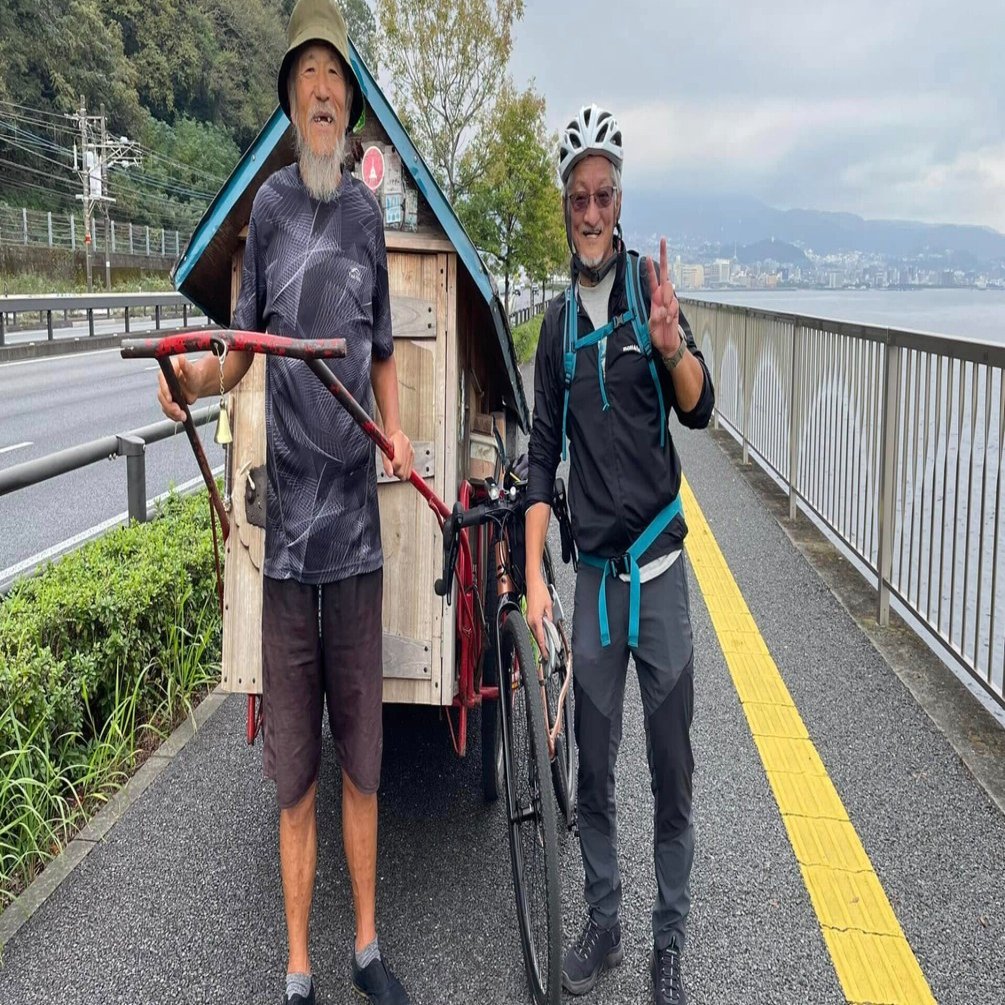 リヤカーを引く旅人｜Hajime Susukida