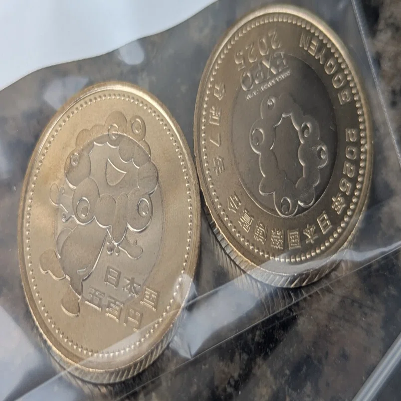 万博記念硬貨の引き換えスタート｜町田 奈桜