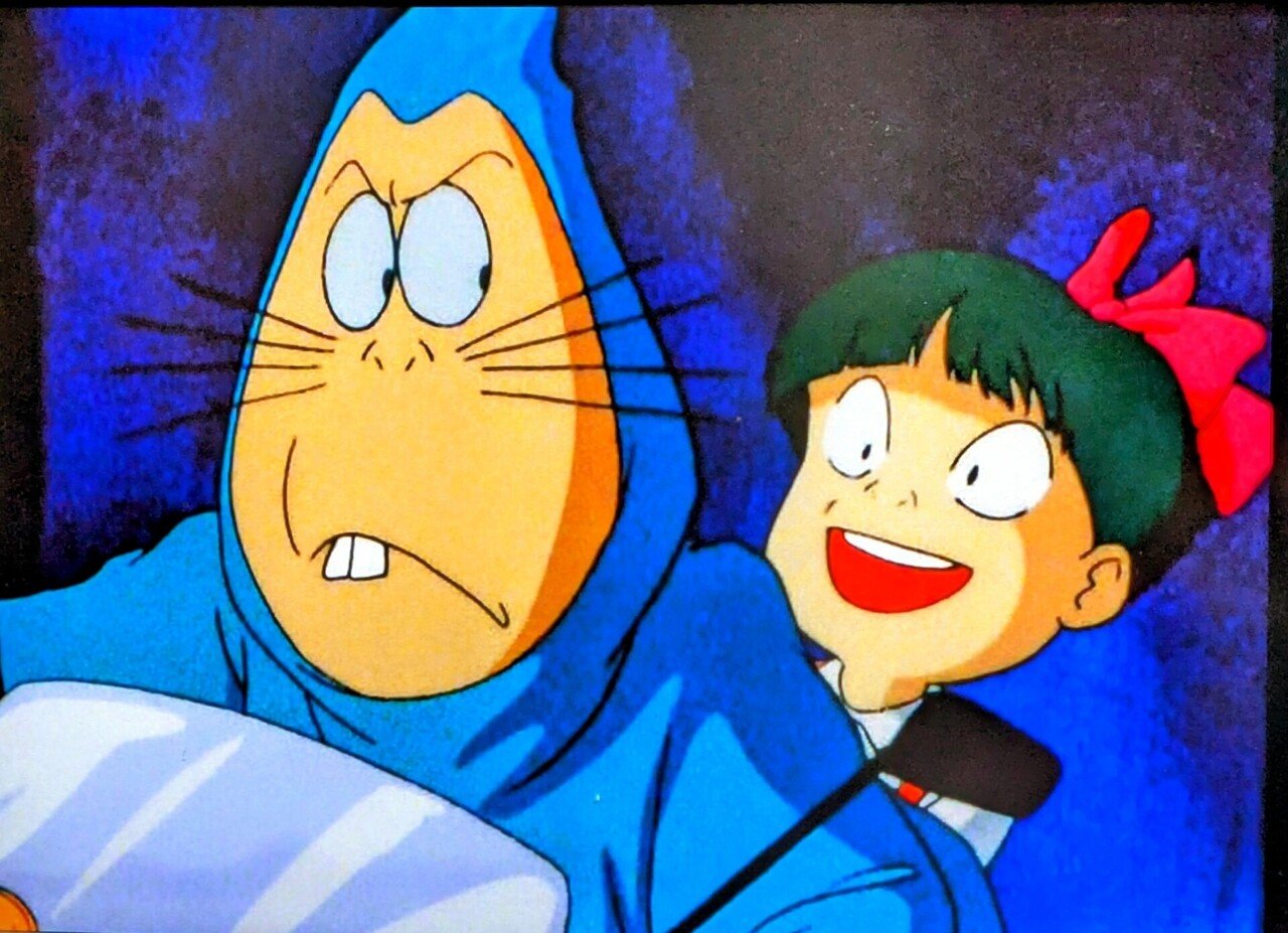 原付で二人乗りするねずみ男と猫娘。おそらく後にも先にもない場面