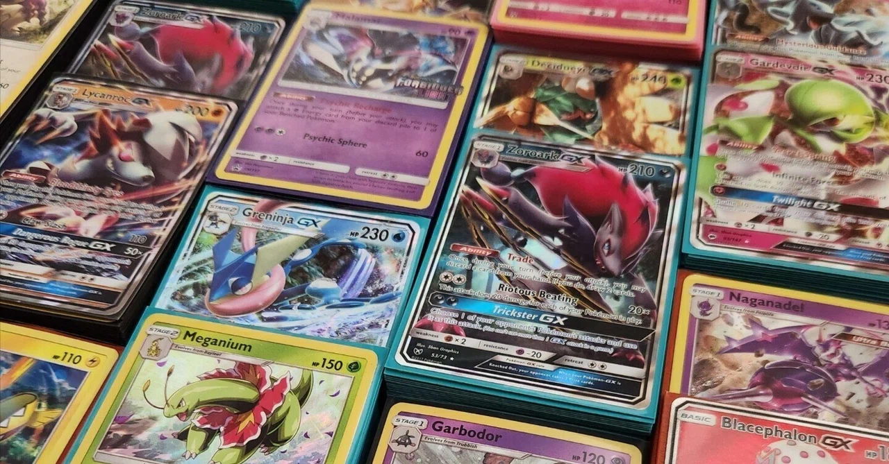 1000 gx pokemon cards Pokemon Tin with 100x Cards Bundle main image 0