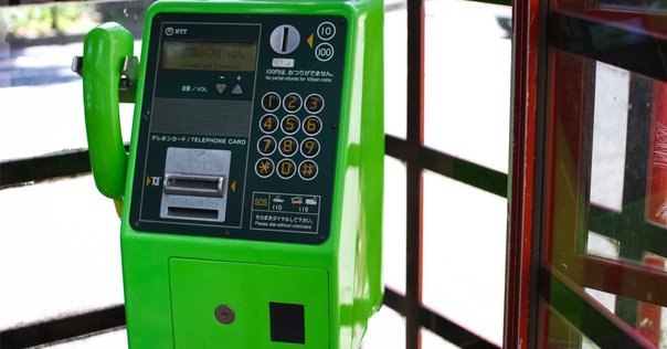 トーンダイヤラーで公衆電話をかけたインドネシア人 1989年｜nshima