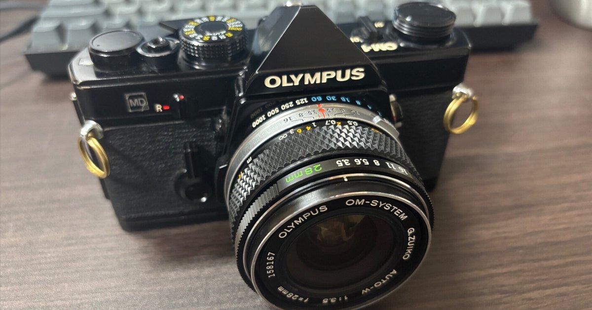 ● OLYMPUS オリンパス OM-1 ■米谷美久 氏 サイン入りパンフ ○ OLYMPUS オリンパス OM-1 □米谷美久 氏 サイン入りパンフ